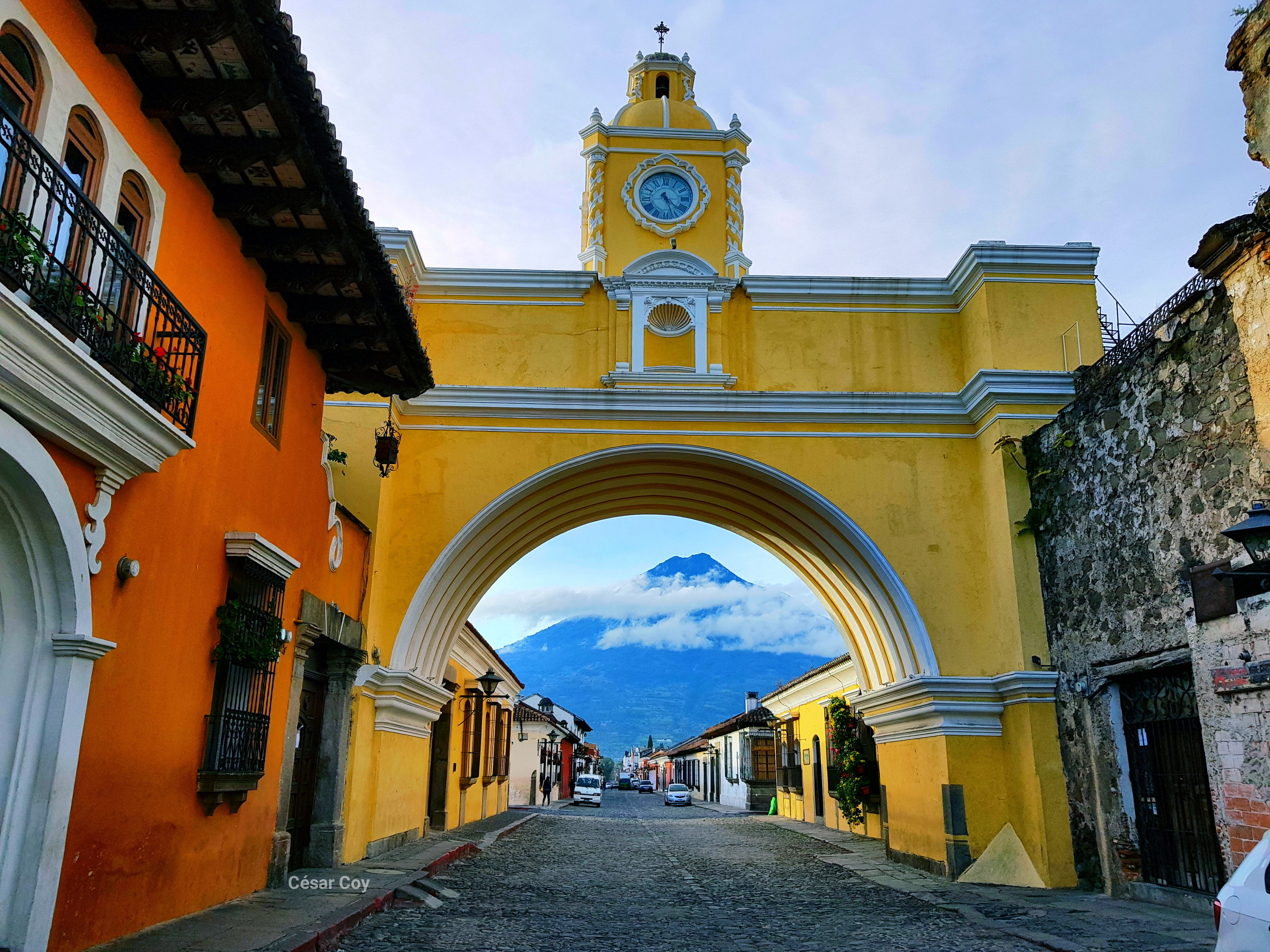 Background image for the scroll-telling video story, showing a panoramic view of Antigua, Guatemala.